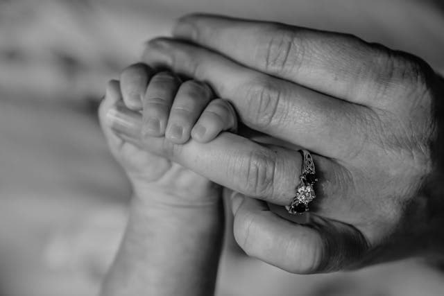 Mother and child holding hands